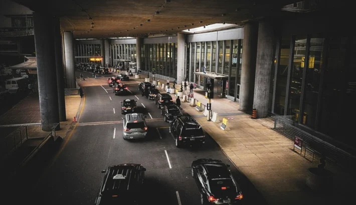 cars queue at airport drop off