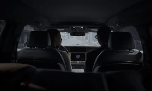 Chauffeur maintaining client privacy and discretion during private transportation