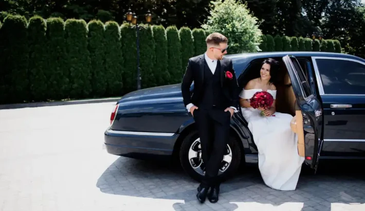 Bride and groom arriving at New Jersey wedding venue in professional transportation
