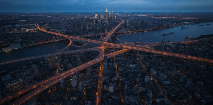 Aerial dusk view of three highway approach routes